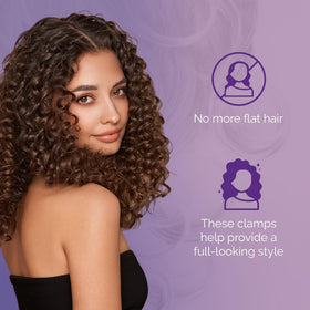 Curl Keeper clip holding a section of curly hair to create visible root lift