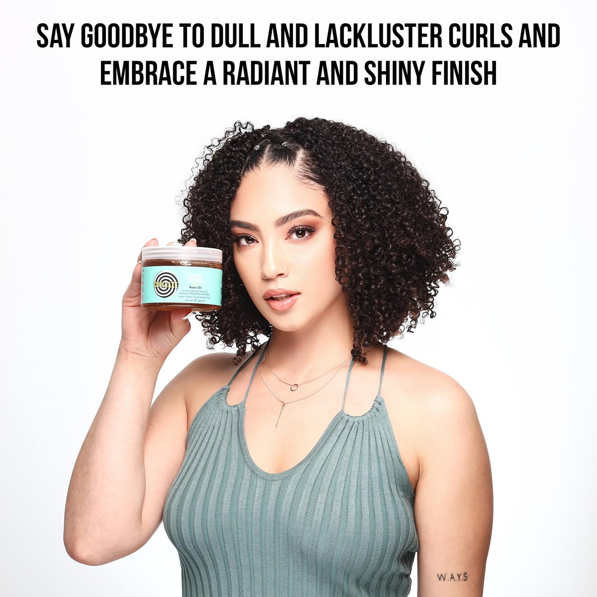 Curldaze product in hand being applied to damp hair for frizz control