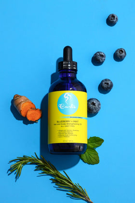 Curls blueberry bliss close-up label highlighting botanical ingredients and clean formula