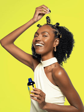 Curls blueberry bliss on hair ends before and after use showing reduced frizz and shine