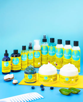 Curls 8 fl oz jar next to a ruler to show scale and travel-friendly size