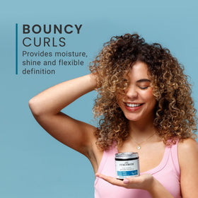 CURLSMITH product being applied to damp curls for smooth distribution