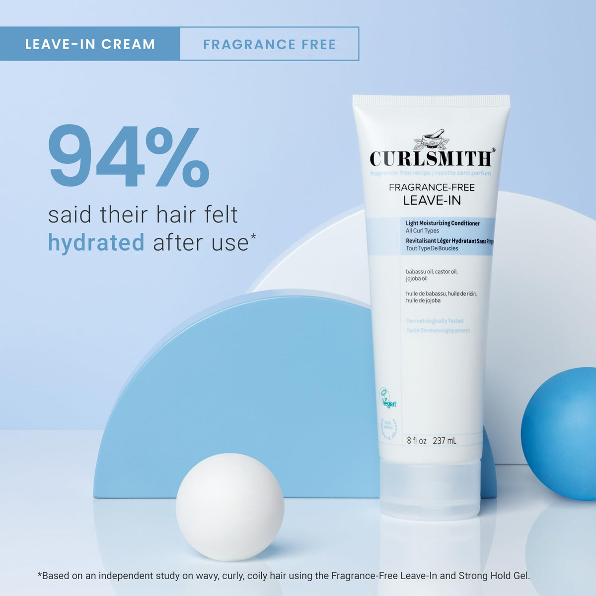 CURLSMITH applying leave-in to curls demonstrating easy distribution and definition