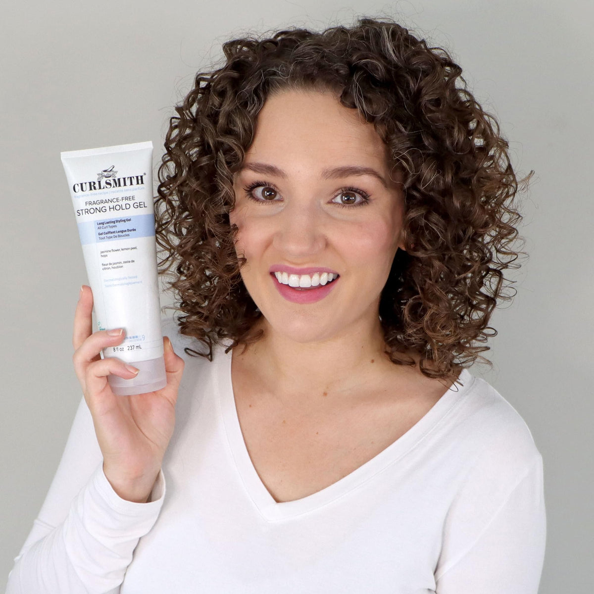 CURLSMITH before and after side-by-side showing reduced frizz benefit