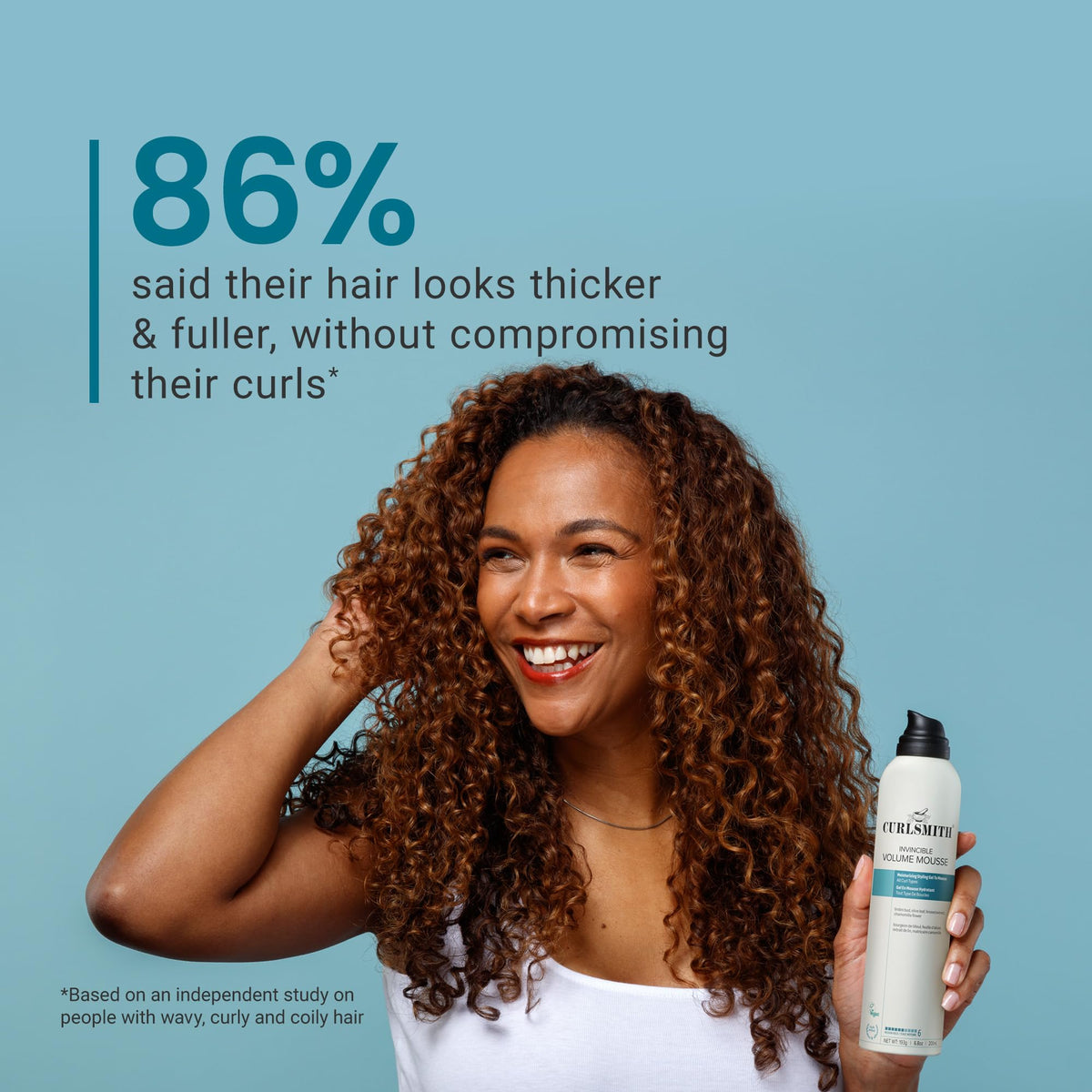 CURLSMITH bottle in hand illustrating 6.8 oz size and portability benefit