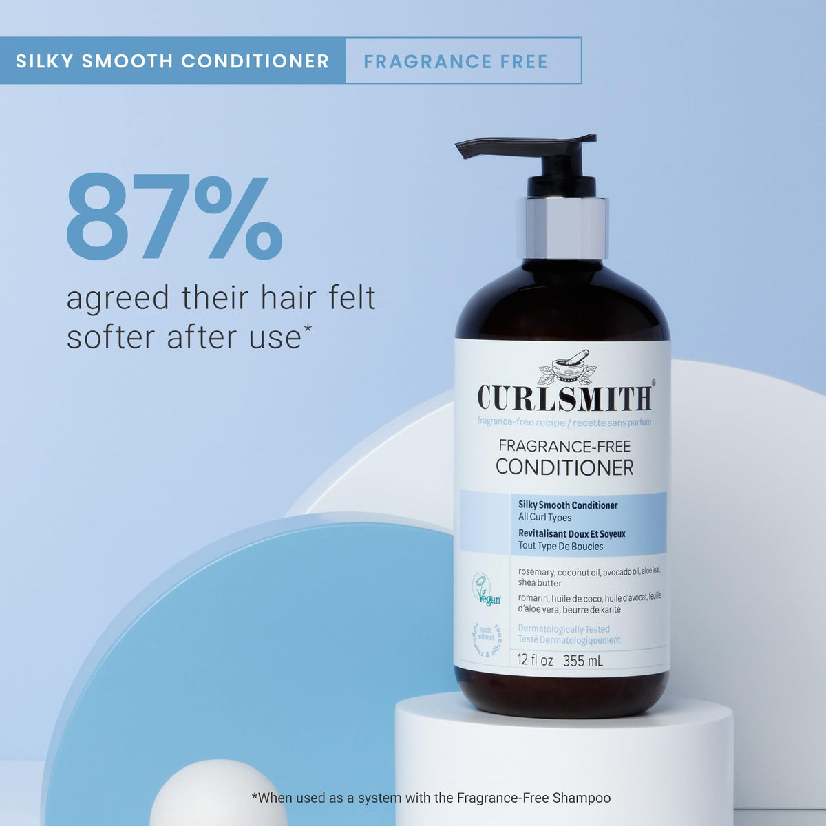 CURLSMITH 12 oz bottle held in hand showing true size and portability benefit