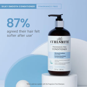 CURLSMITH 12 oz bottle held in hand showing true size and portability benefit