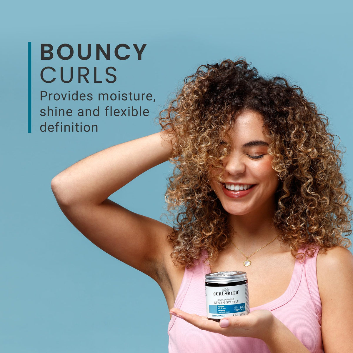 CURLSMITH styled tight curls illustrating defined, frizz-controlled finish