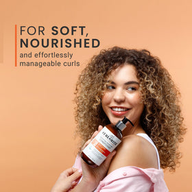 CURLSMITH detangling demo with comb showing smoother, easier styling