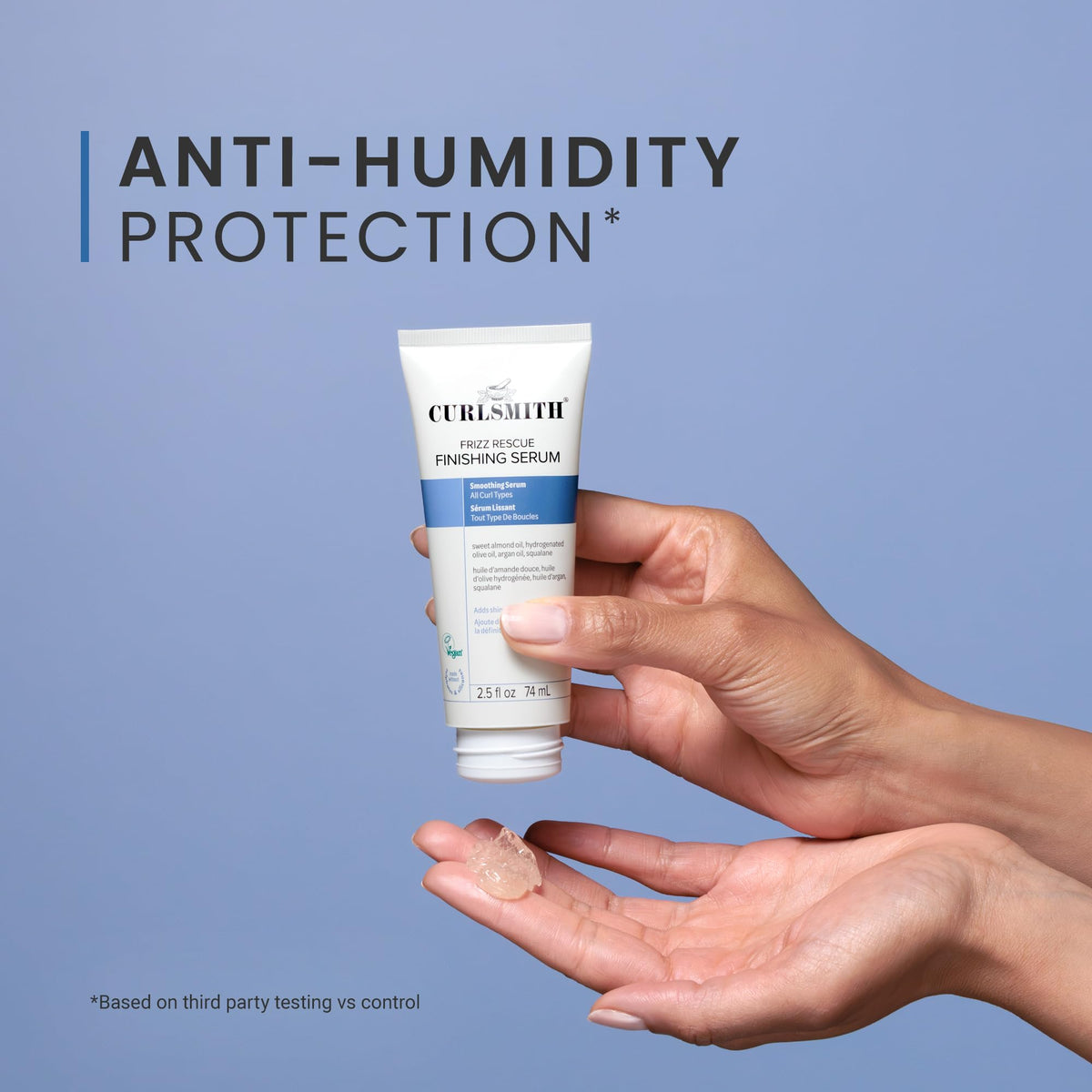 CURLSMITH 2.5 oz bottle in hand showing travel-friendly size and convenient portability