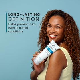 CURLSMITH gel being applied to wet curls for even distribution and hold