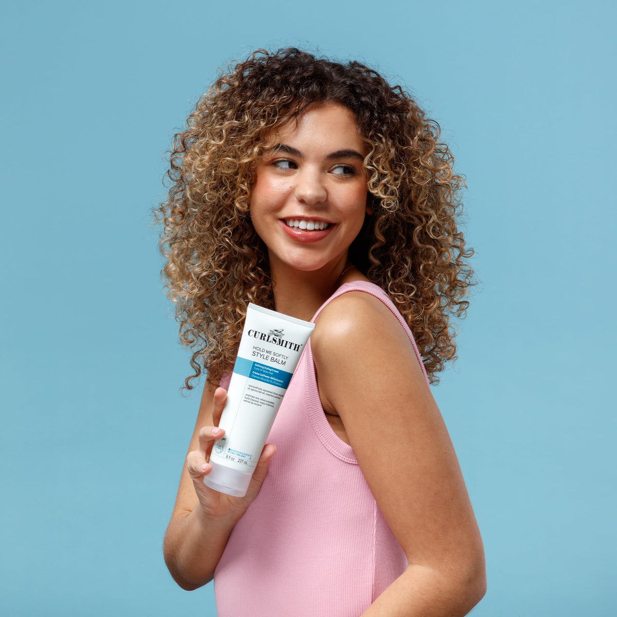 CURLSMITH ingredient label close-up highlighting vegan and sulfate-free benefit