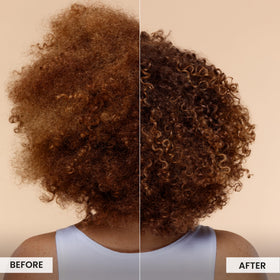 CURLSMITH applying salve to curly hair pre-shampoo demonstrating bond-building benefit