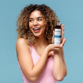 Curlsmith ingredients display highlighting botanical extracts and curl-loving actives