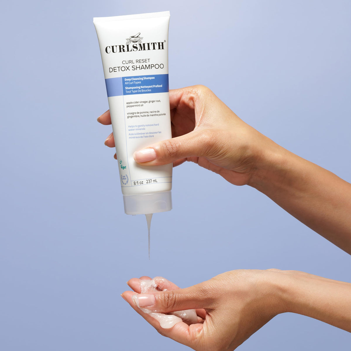 CURLSMITH label close-up highlighting mineral removal claims