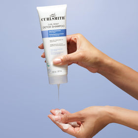 CURLSMITH label close-up highlighting mineral removal claims