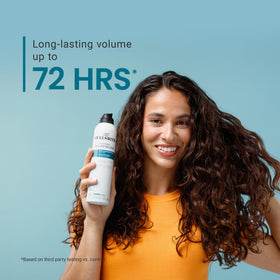 CURLSMITH applying mousse to curly hair for enhanced lift and bounce