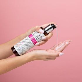 CURLSMITH lotion on hand showing lightweight texture and non-sticky feel