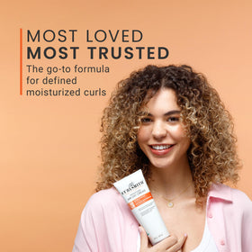 CURLSMITH product in use on wavy hair showing natural definition and movement
