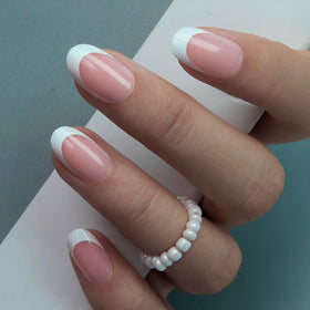 CurvLife application kit laid out with glue, tabs, file and nails