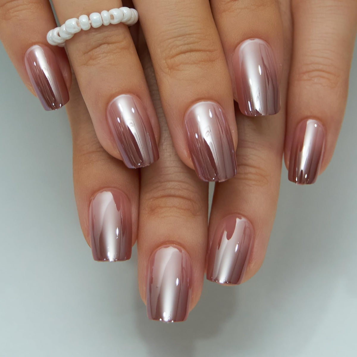CurvLife press-on nails applied on hands in lifestyle scene for ready wear