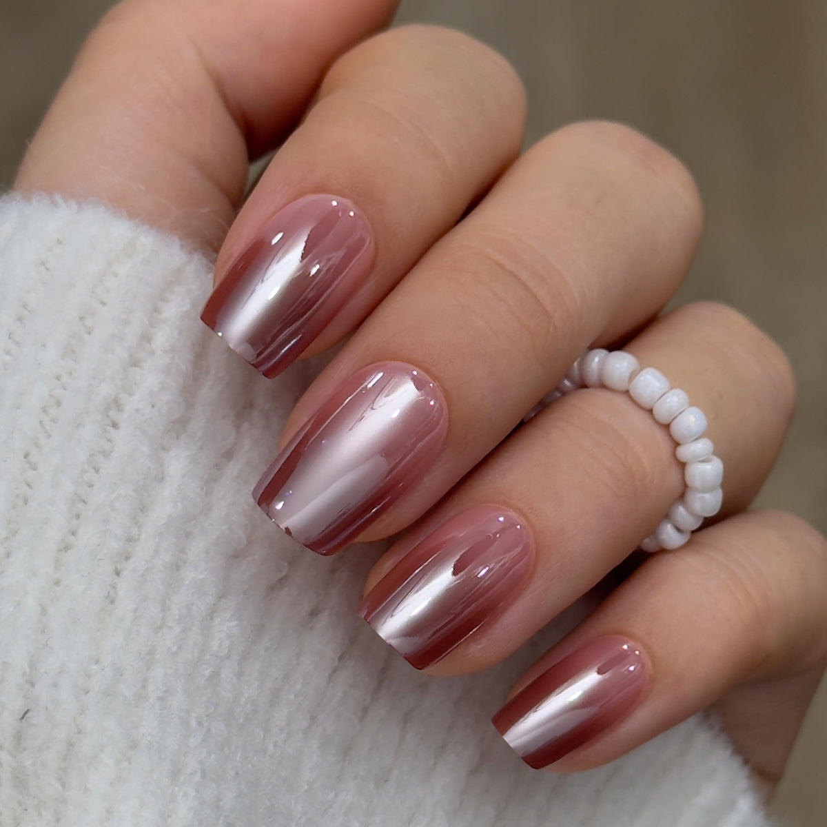 CurvLife close-up of glossy apricot gel finish highlighting handcrafted detail