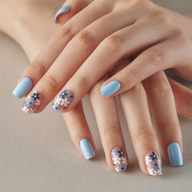 CurvLife nails on a hand showing size options and natural short fit benefit