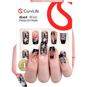 CurvLife close-up of apricot nude nails with black butterfly for refined style