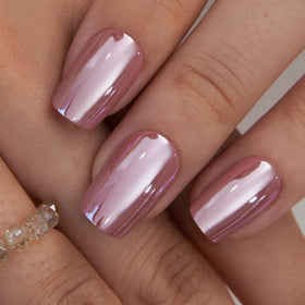 Curvlife close-up of pink glitter French tip detail highlighting artisan finish