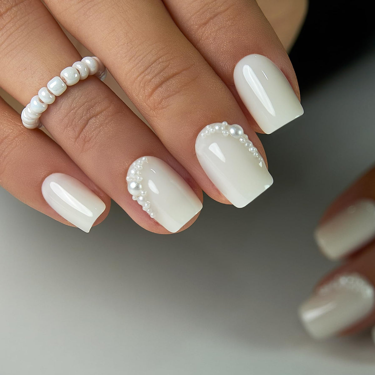 Curvlife close-up of pearl crescent detail highlighting elegant accent