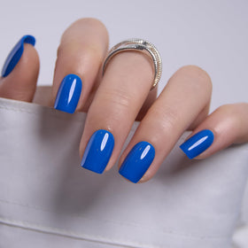 CurvLife close-up of glossy cobalt rush finish highlighting salon-quality shine