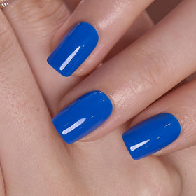 CurvLife nails being applied with adhesive illustrating quick at-home manicure benefit