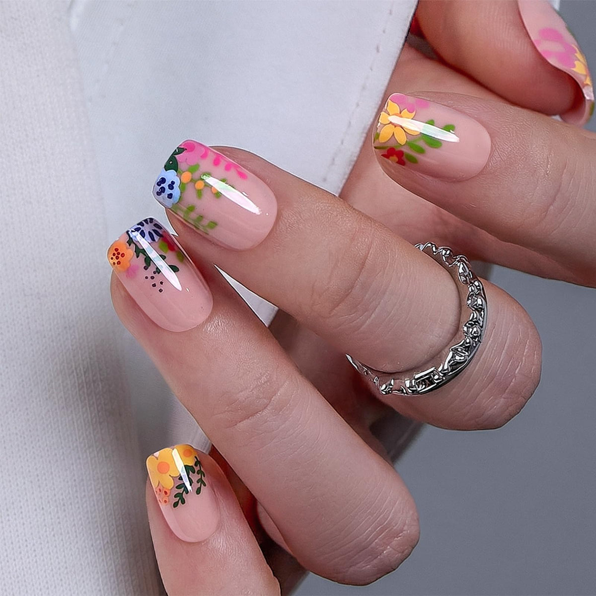 CurvLife front packaging showing nude flower press-on nails and included kit benefits