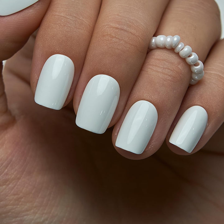 CurvLife front view of white square press-on set showing full-coverage nails benefit quick application