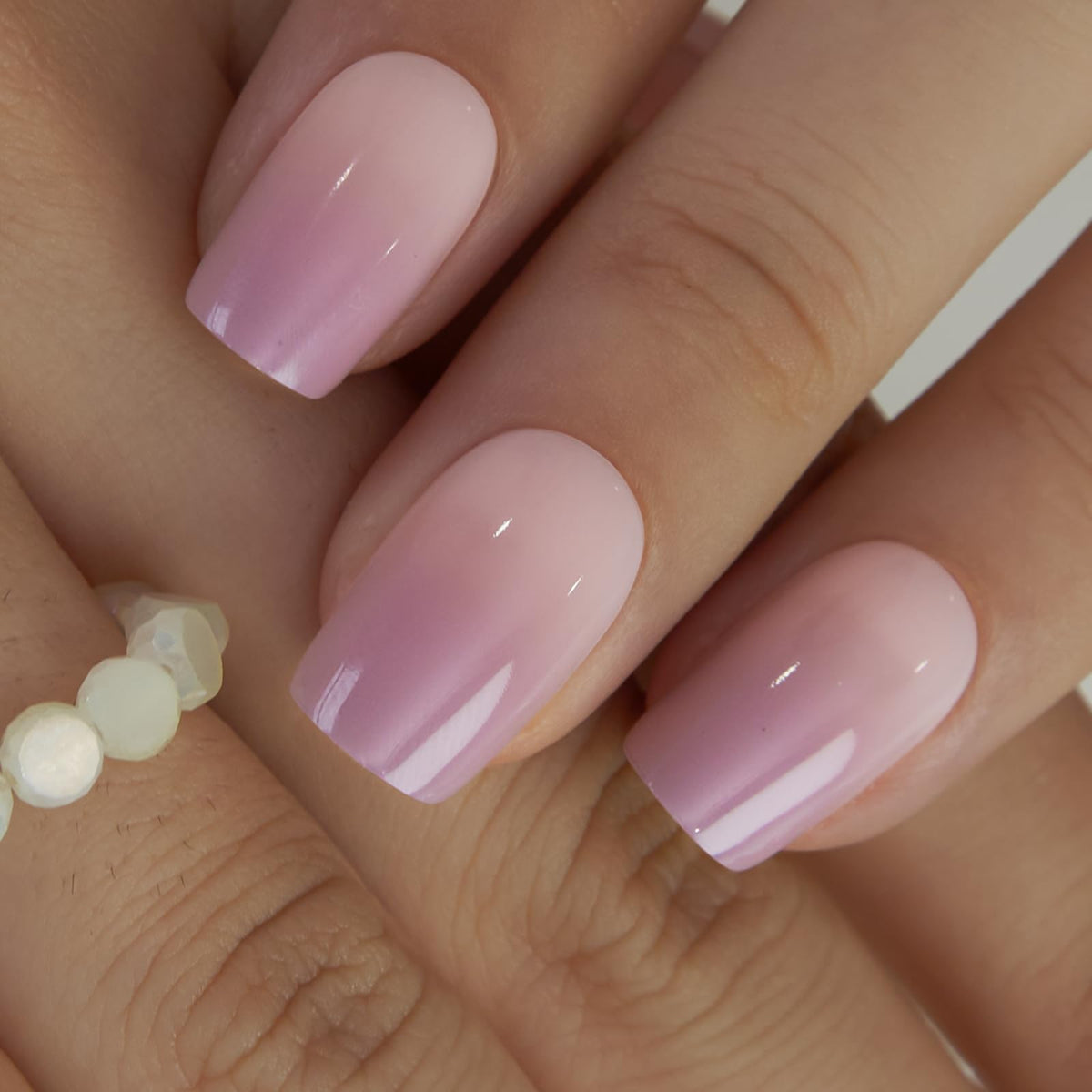 CurvLife macro of gradient pink-to-purple texture showing salon-quality shine