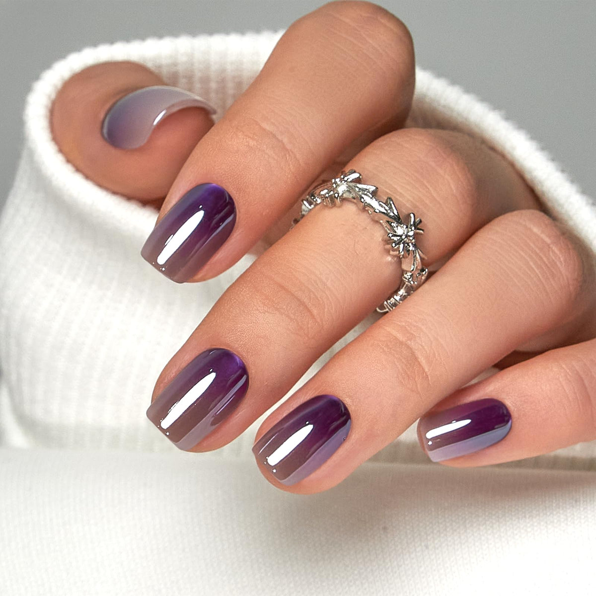 CurvLife nails in hand to show scale and comfortable short square size