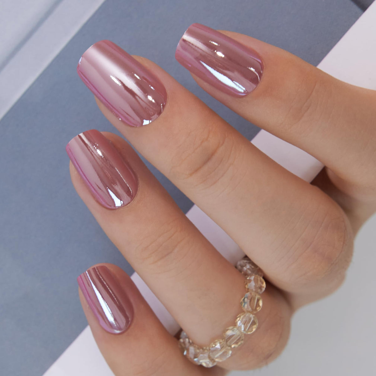 Curvlife nails worn while typing showing durable finish for daily tasks