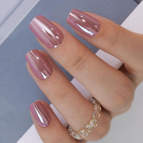 Curvlife nails worn while typing showing durable finish for daily tasks
