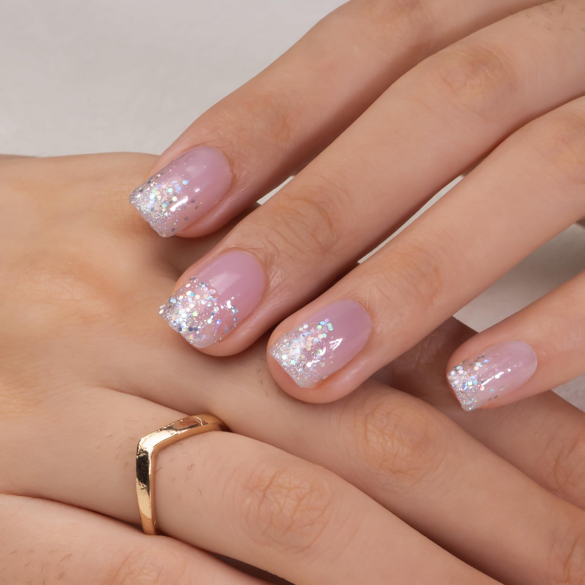 CurvLife lifestyle shot wearing nails while typing for durability