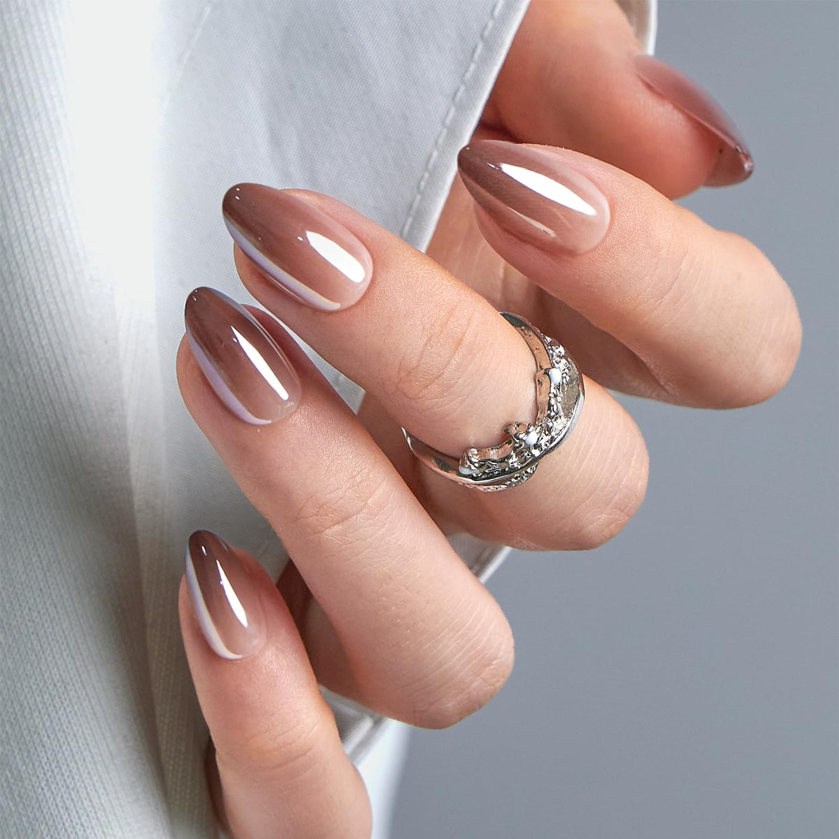 CurvLife mocha chrome front packaging shows polished almond nails and benefits
