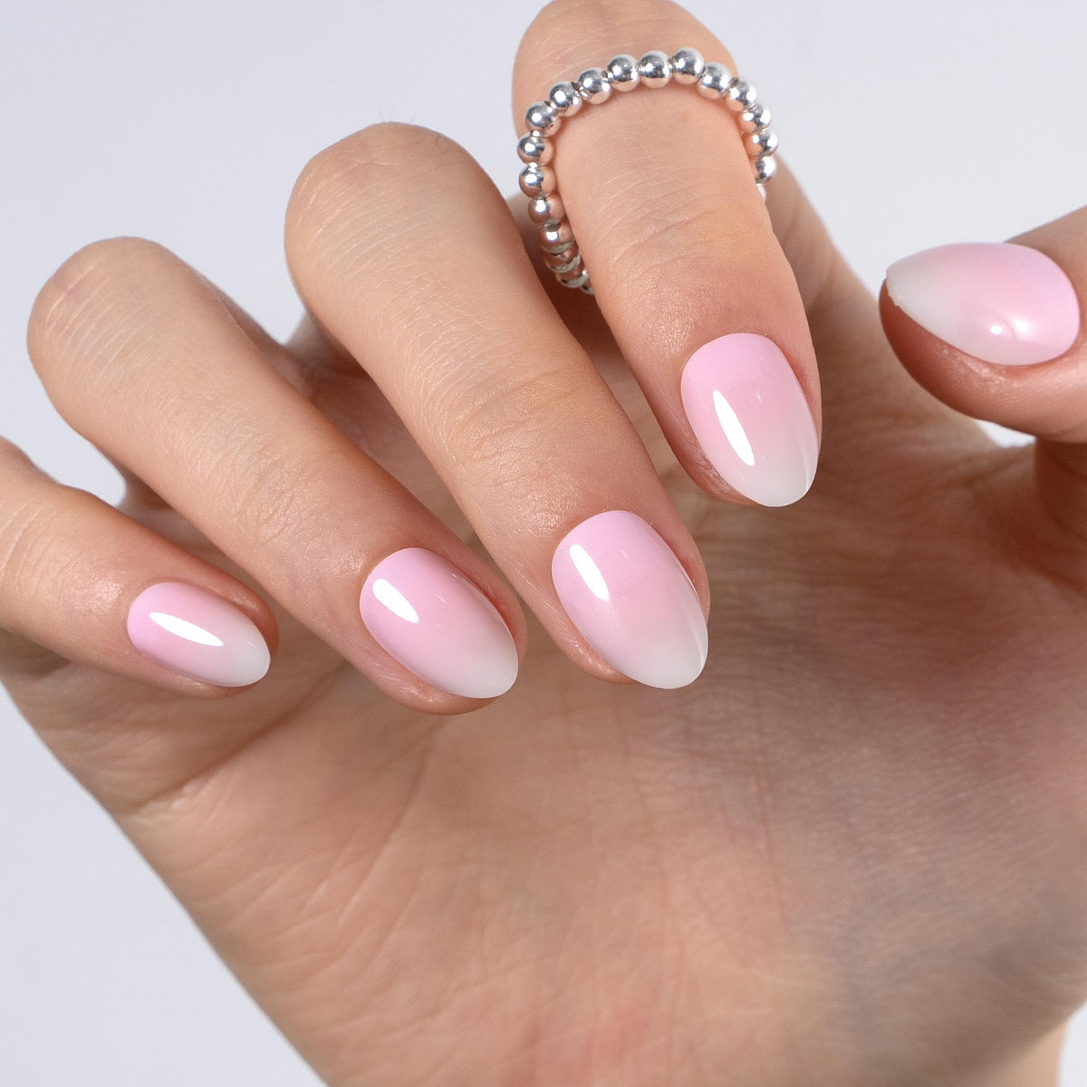 CurvLife 30-piece press on nail layout displaying variety of sizes for precise fit