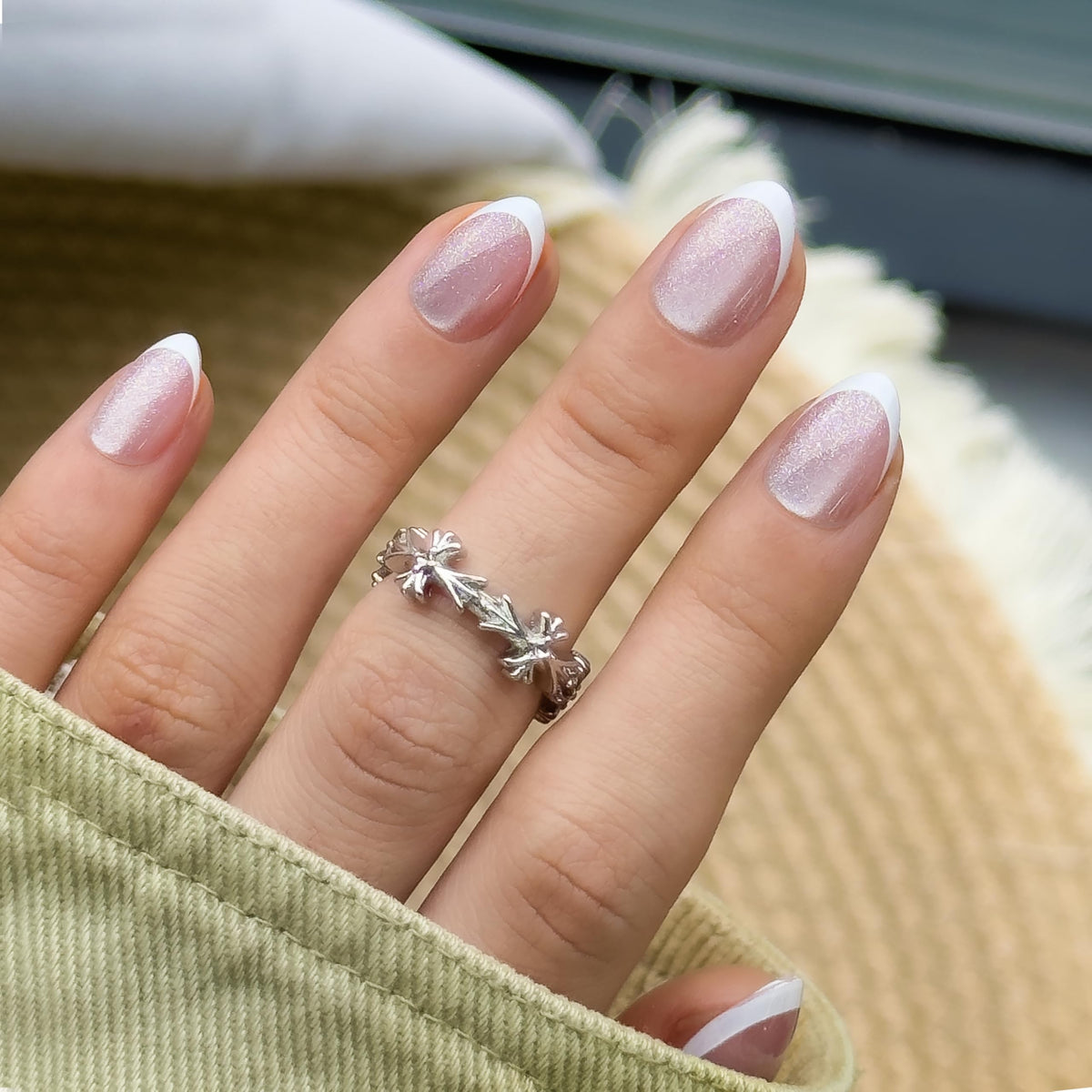 CurvLife nails in-hand during application demonstrating easy press-on installation for fast results