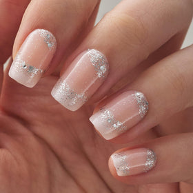 CurvLife nails on hand demonstrating comfortable medium square French diamond style