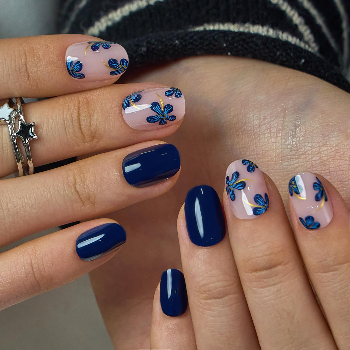 CurvLife press-on nails in hand to show extra-short square scale and natural fit