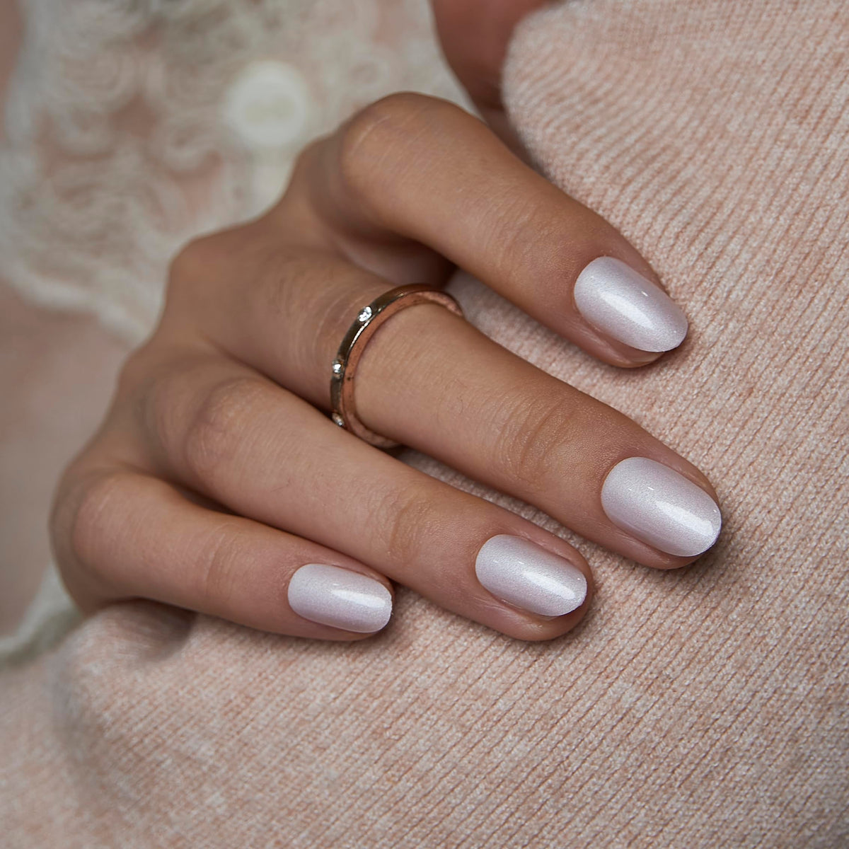CurvLife side profile of short oval nail demonstrating low-profile fit and comfortable wear
