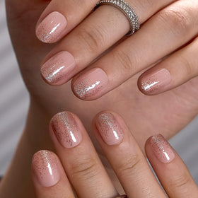 CurvLife size comparison on a hand demonstrating natural short-nail fit