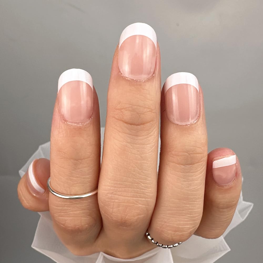 CurvLife nails worn on hands in lifestyle scene providing polished neutral look