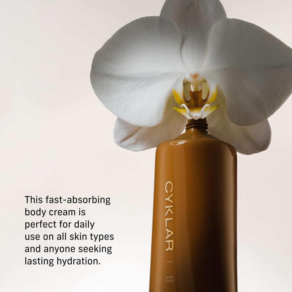 CYKLAR 8oz tube beside everyday items showing size and travel convenience