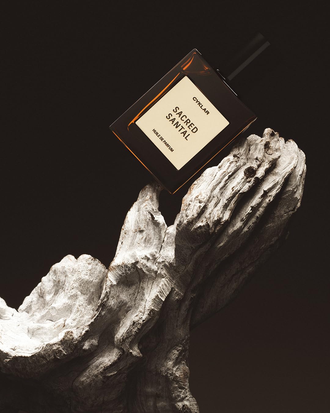 CYKLAR Sacred Santal oil texture on skin close-up showing smooth absorption benefit