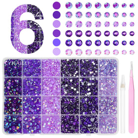 Cynailli front box open showing organized purple jelly rhinestones and included tools